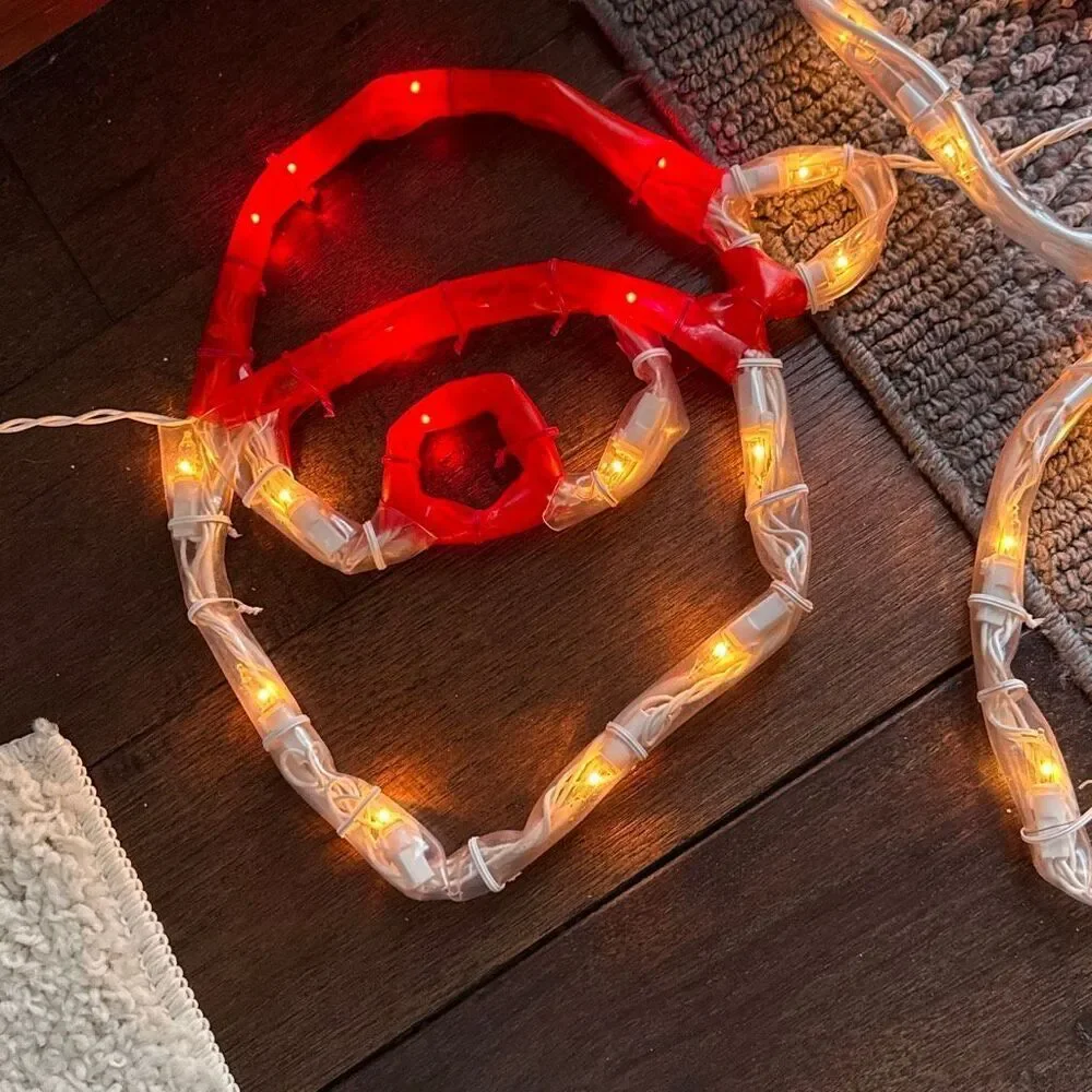Vintage 1990s Mr Christmas mini mini light up sculpture string lights Santa face